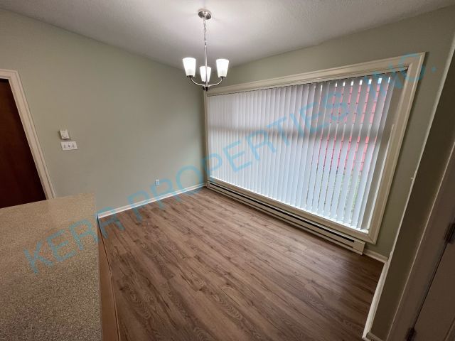 Building Photo - FREE RENT! Charming 2-Bedroom Sanctuary in...