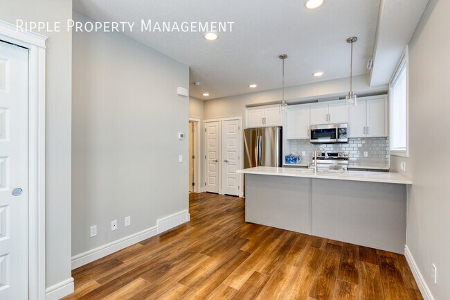 Photo du bâtiment - COZY 1 BED/ 1 BATH TOWNHOUSE IN THE COMMUNITY OF SADDLE RIDGE