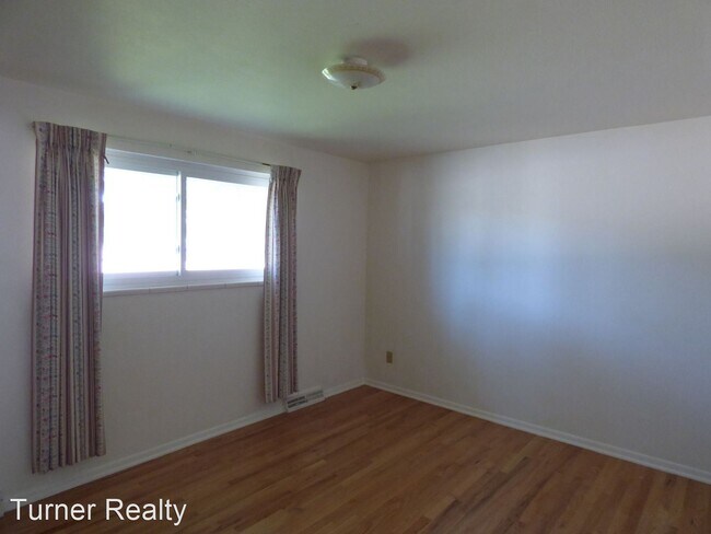 Foto del edificio - 4 br, 1.5 bath House - 1200 S. Pratt Pkwy
