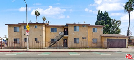 Building Photo - 7706-7706 S Grand Ave