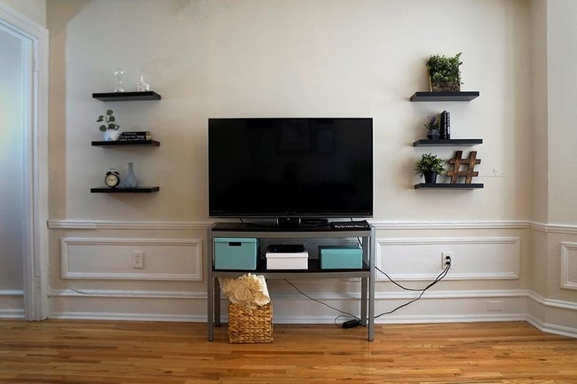 Living Room - The Legacy at Drexel Arms Apartments