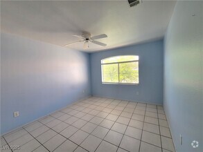 Building Photo - 5415 W Harmon Ave