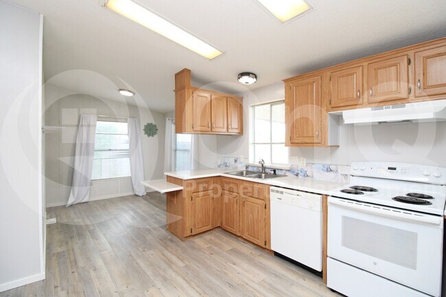 Building Photo - 9721 E Empress Ave