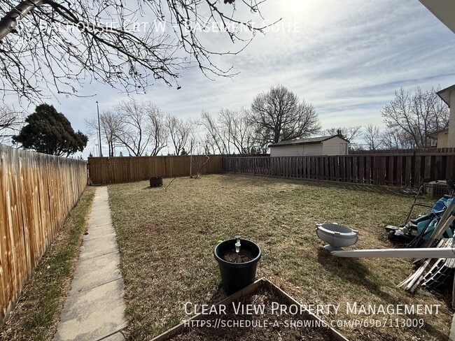 Building Photo - Bright 1-bedroom plus office lower-level suite with fully fenced yard and Utilities Included!