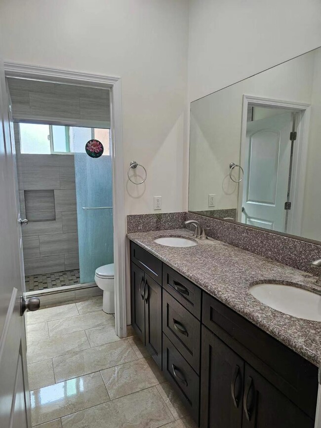 1 bathroom, 2 sinks - 7655 Fern Ave