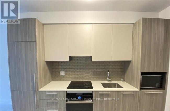 Photo du bâtiment - 65 Broadway Ave