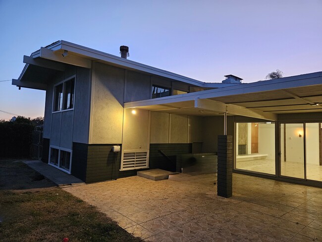 Back of house - huge covered patio - 3657 Broadmoor Blvd