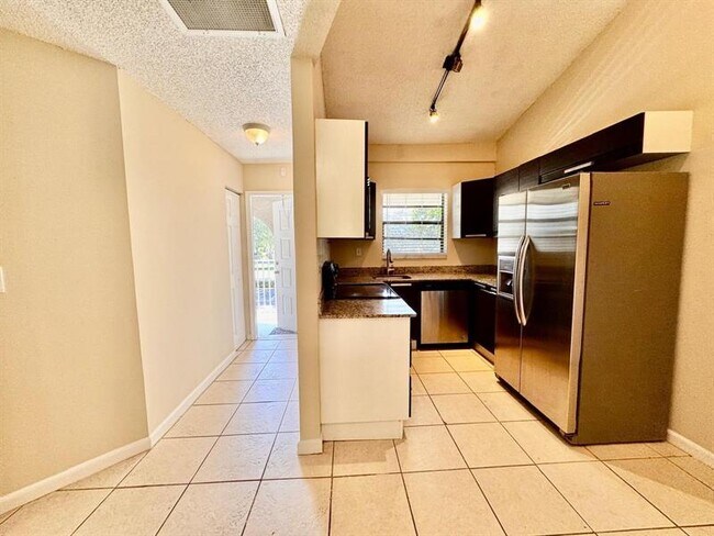 Building Photo - 11211 Royal Palm Blvd