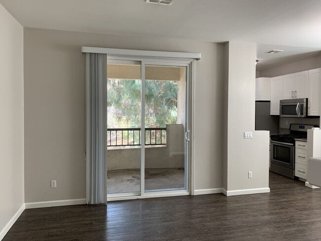 Building Photo - Sabre Springs Top Floor Condo with Carport