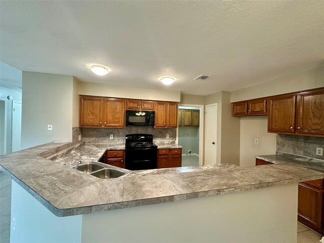 Foto del edificio - 8514 Fawn Terrace Dr