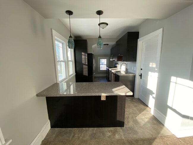 Kitchen view from Living area - 3430 24th Ave S