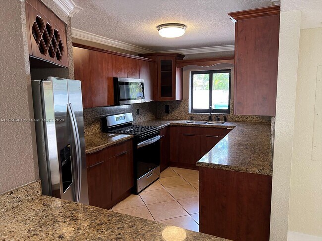 Building Photo - 6752 Crooked Palm Terrace