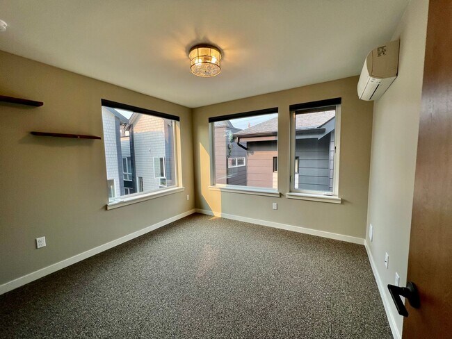 Building Photo - Modern Greenwood Townhome - Just Reduced Monthly Rental Rate