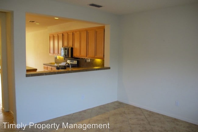Building Photo - 3 br, 2.5 bath House - 2868 Pearblossom Dr.