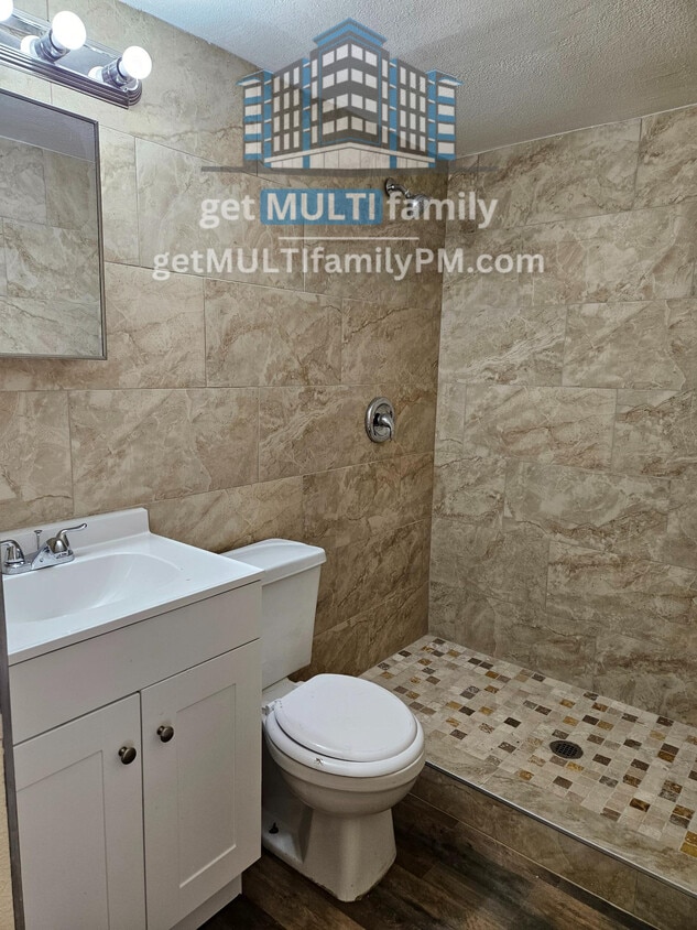 Building Photo - Tranquil Security: Experience 1 Bedroom, 1...