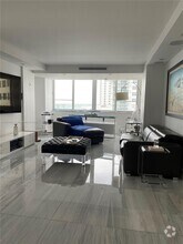 Building Photo - 5005 Collins Ave