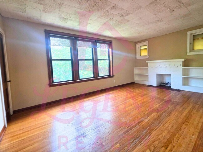 Building Photo - 4942 Tholozan Ave