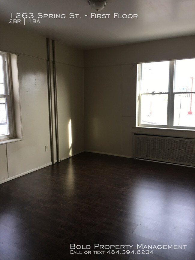 Building Photo - 1st floor Apartment on Spring & 13th