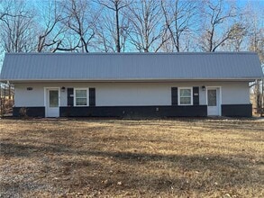 Building Photo - 6158 Suwanee Dam Rd