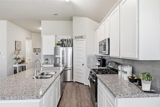 Building Photo - 14815 Rain Tree Dr