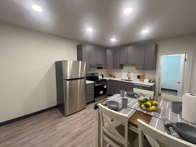 Building Photo - Newly Renovated Apartments Steps Away From...