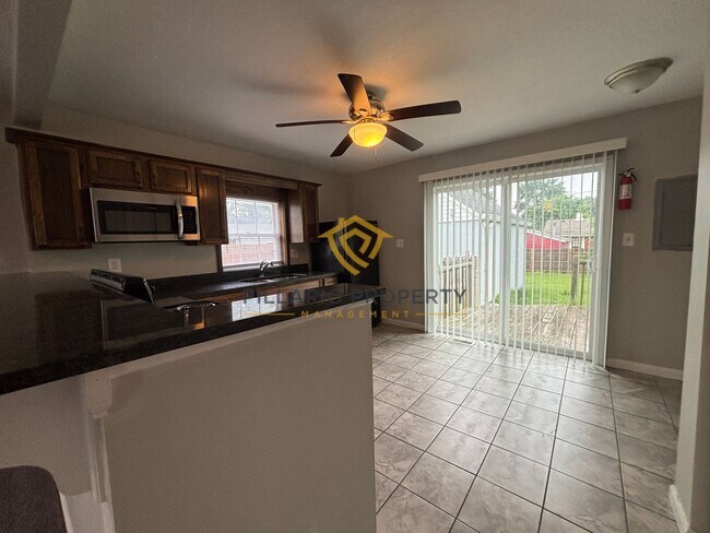 Building Photo - Charming 2-Bedroom Home with Spacious Yard Near Garfield Park, Available NOW!