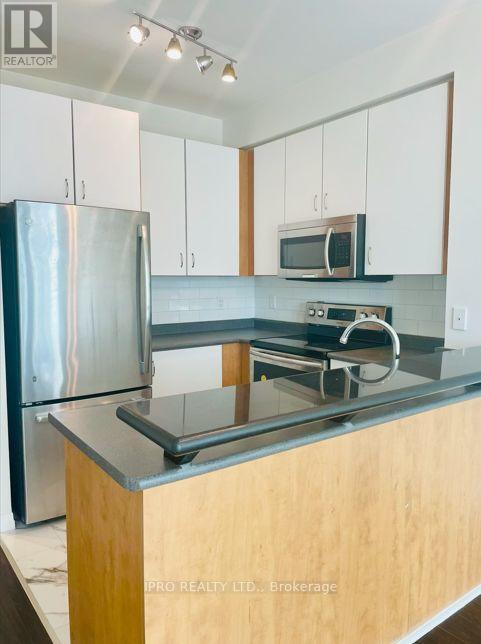 Photo du bâtiment - 220-2220 Burnhamthorpe Rd W