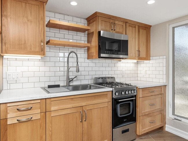 Building Photo - Studio with Loft, Private Patio, and All U...