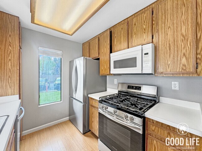 Building Photo - Bright 2BD/2BA Corner Unit Condo in Mira Mesa with Dual En-Suite Baths, Patio & Pool