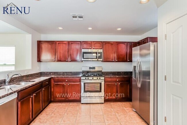Building Photo - Spring into savings with 50% off your firs...