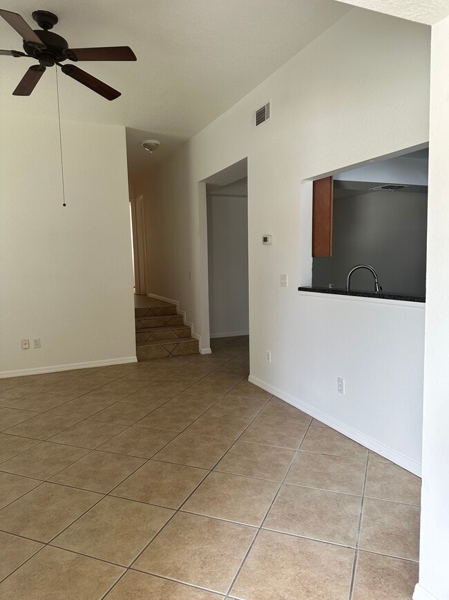 4 steps up to the bedrooms and pass-thru window to kitchen. - 362 Springdale Dr