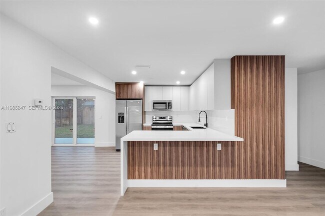 Photo - 3180 NE 10th Terrace House