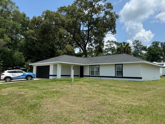 Building Photo - Beautifully Renovated Home In the Shores  3/2/2 **WON"T LAST**