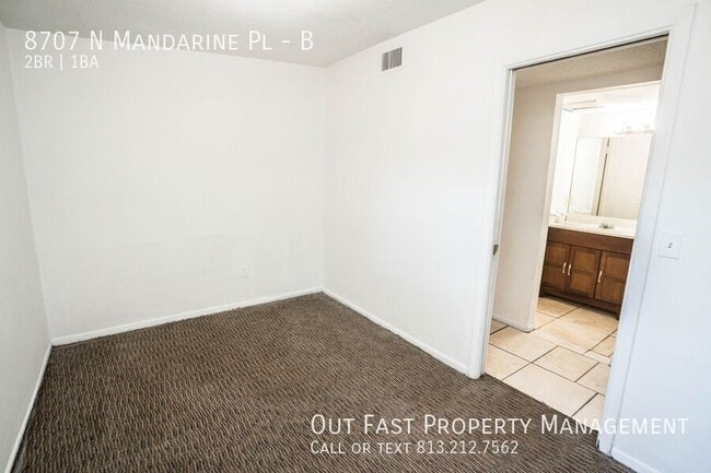 Building Photo - 8707 N Mandarine Pl