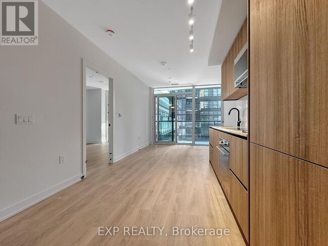 Photo du bâtiment - 117-117 Broadway Ave
