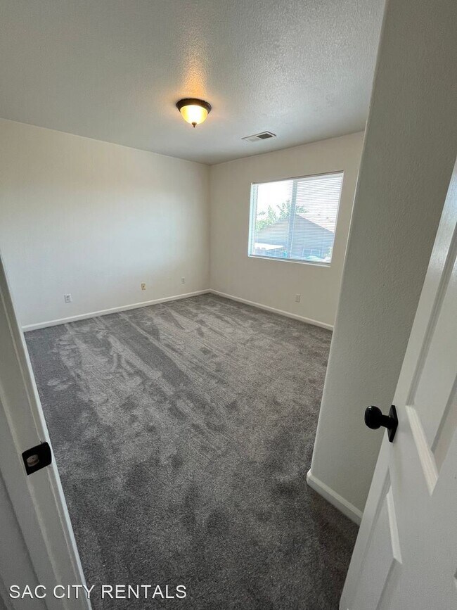 Building Photo - 4 br, 2.5 bath House - 10040 Wild Orchid Way
