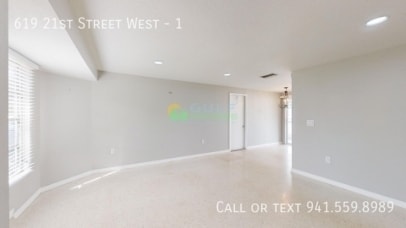 Photo - 619 21st Street West - 1- House