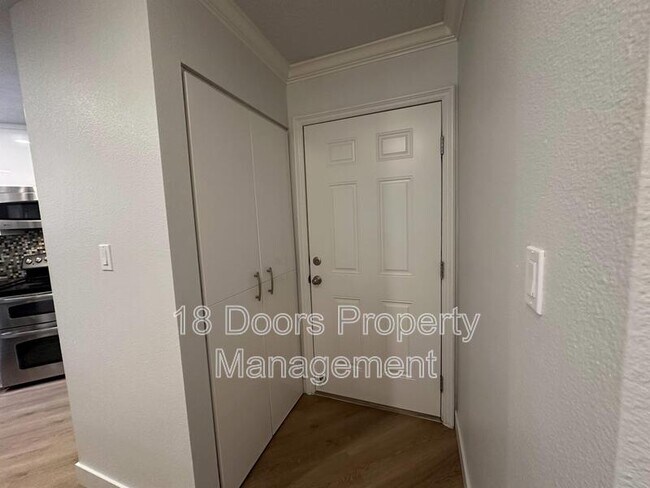 Building Photo - 7565 Charmant Drive Unit 411