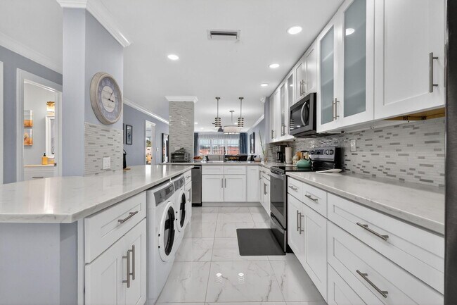 Foto del edificio - 5675 Queen Palm Ct