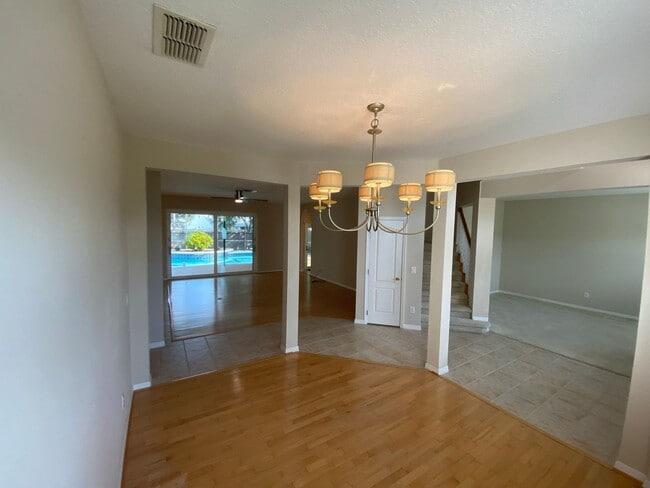 Building Photo - Exceptional 5 Bed/3 Bath Pool Home with Wh...