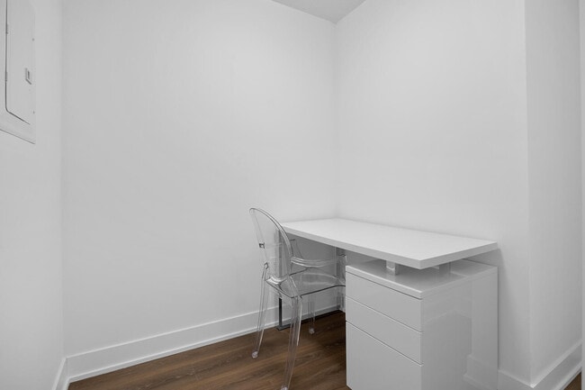 Building Photo - One Plus Den Furnished unit