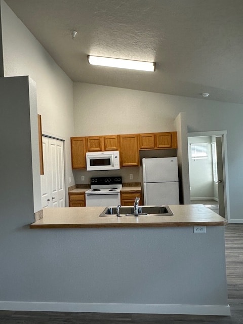 Área de cocina y lavandería - Faith Landing Apartments