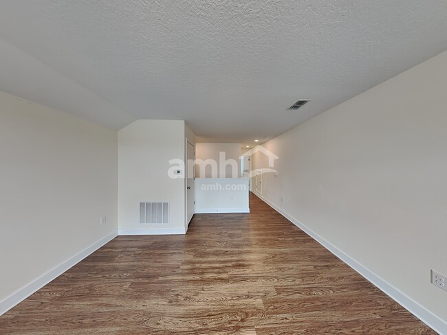 Building Photo - 6614 Hidden Rose Place