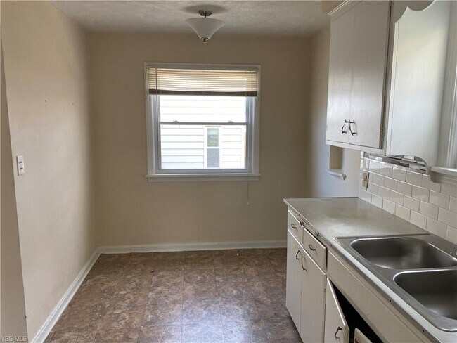 Foto del edificio - 5213 E 119th St
