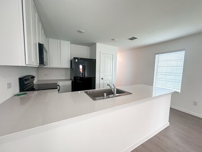 Foto del edificio - 910 Sandhill Crane Ln