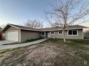 Building Photo - 9503 E Ave T 12
