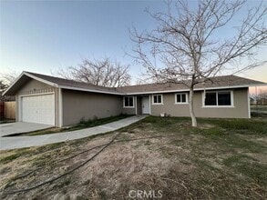 Building Photo - 9503 E Ave T 12