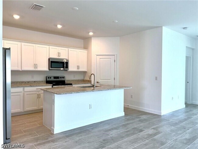 Foto del edificio - 10525 Timber Creek Dr
