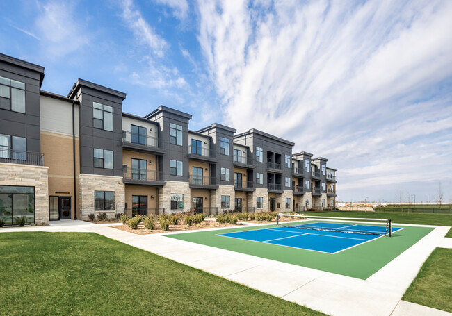 Independent Living apartments and the pickleball court. - Randall Residence at Gateway Park