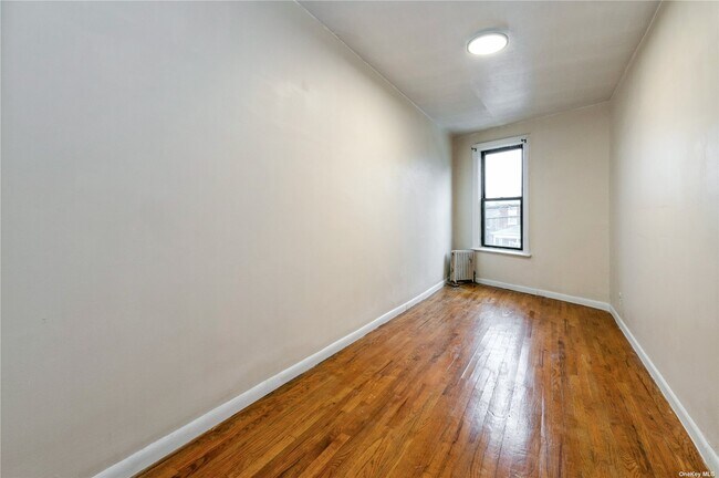 Building Photo - 67-05 Woodside Ave